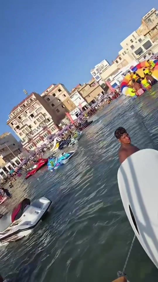 Jet ski et bateau au large, Corales Plage